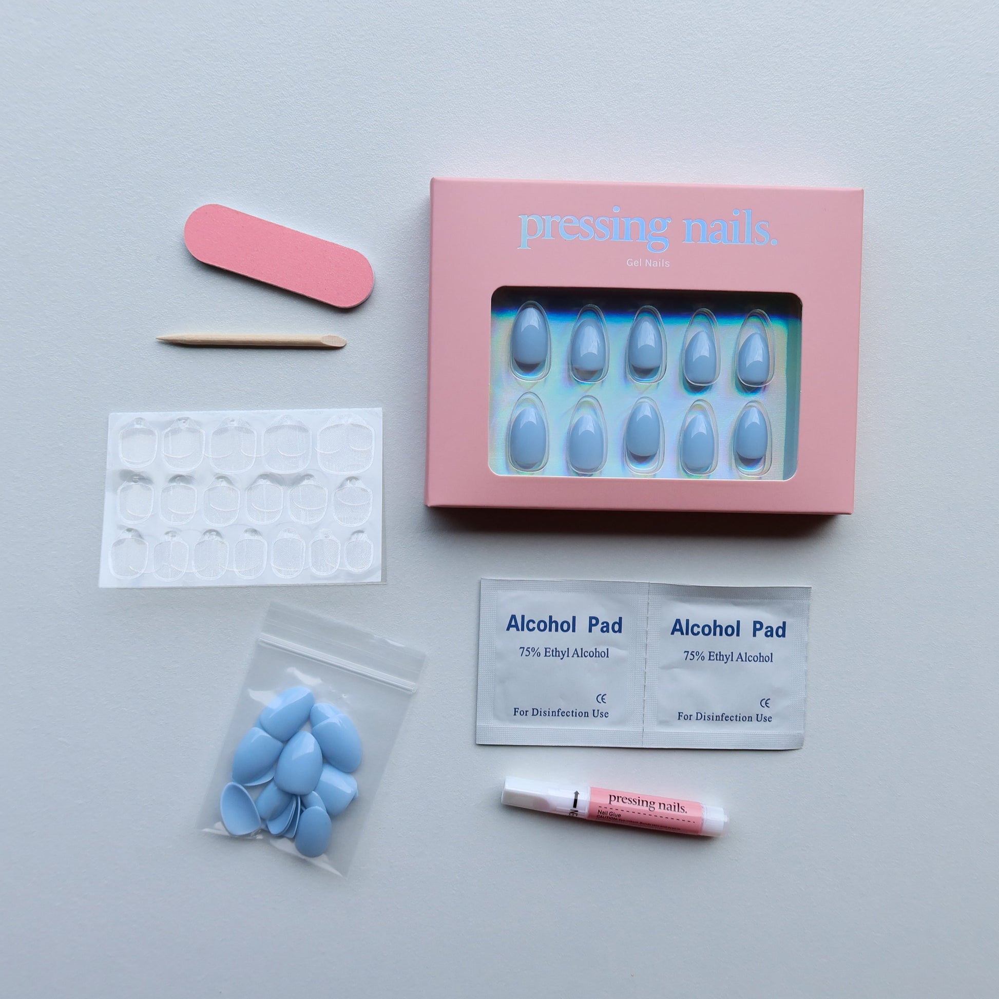 Press on nail kit with nail glue, alcohol pads, short-wearr tabs, nail file. 