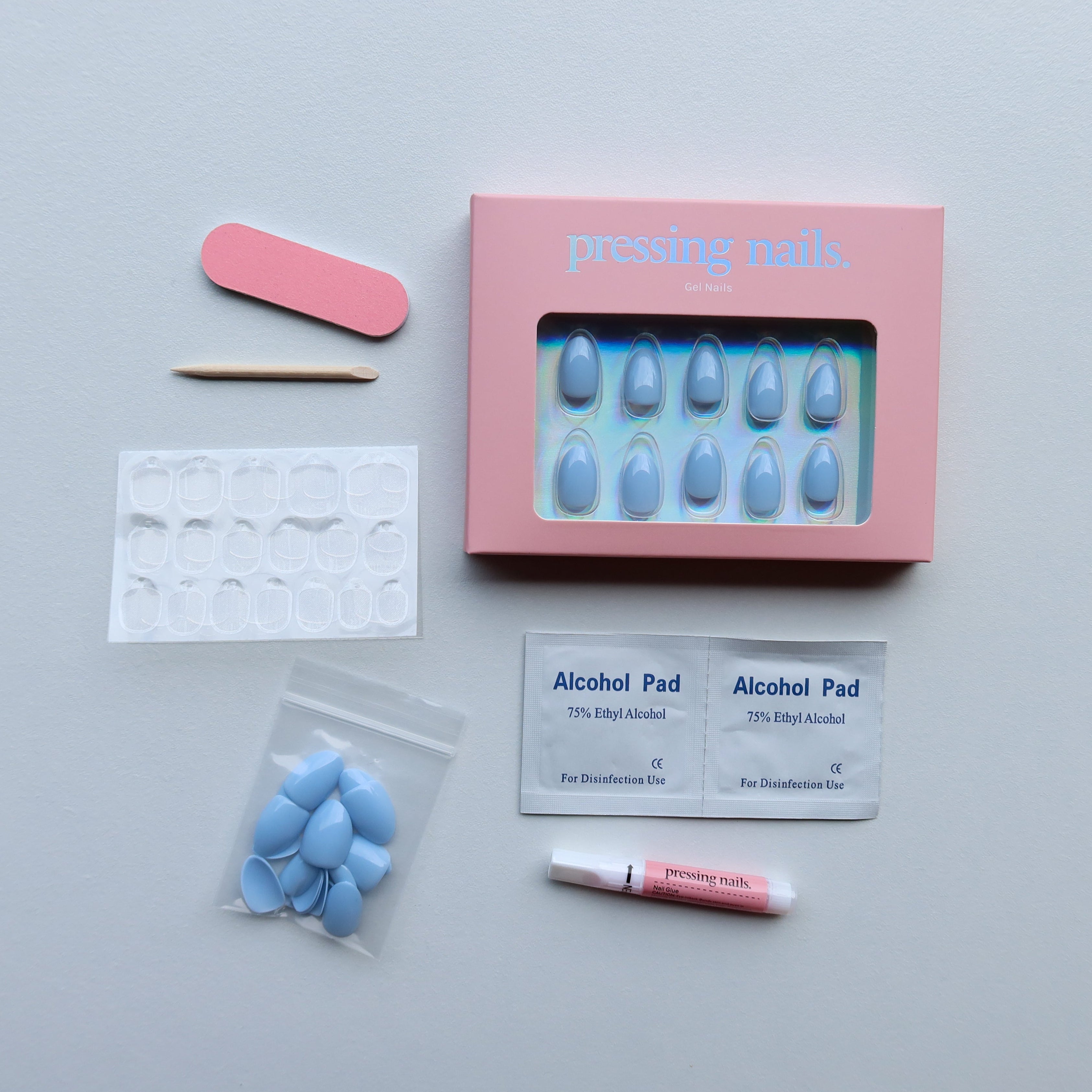Press on nail kit with nail glue, alcohol pads, short-wearr tabs, nail file. 