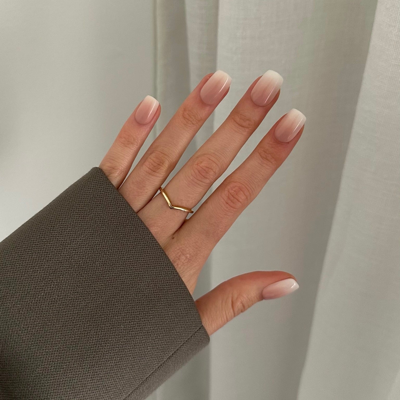 Wearing ombre pressing nails press on nails, square shaped. 